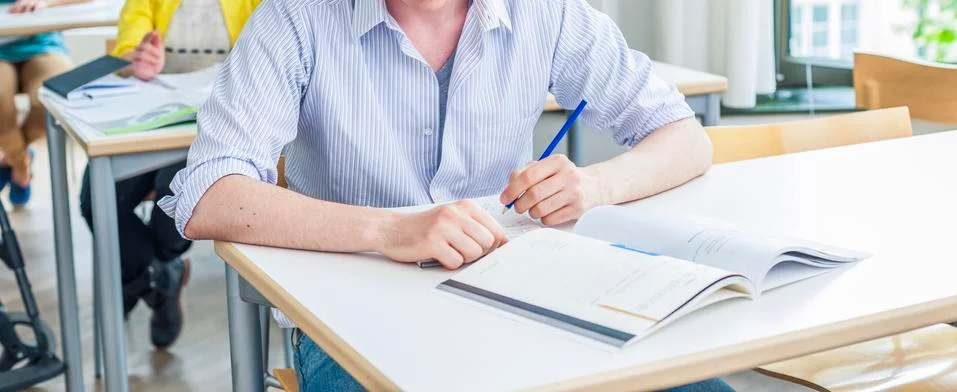 Students during a lesson in classroom Stock Photos
