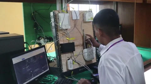 Students during a practical exam on computer network installation Stock Footage 322029941