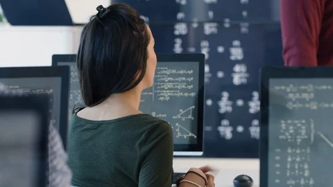 Students of engineering discussing in physics lecture Stock Footage 106674705