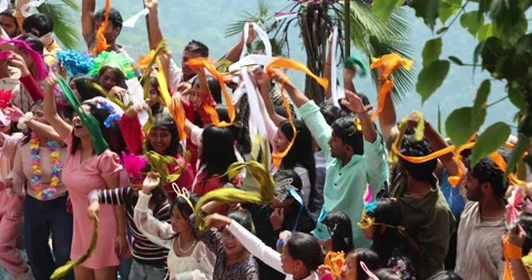 Students enjoy a lively group dance at a scenic hill station resort 스톡 동영상 340275130