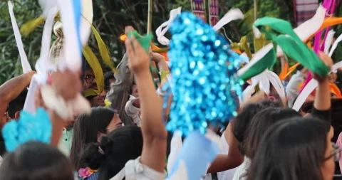 Students enjoy a lively group dance at a scenic hill station resort Video stock 340279059
