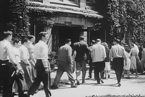 Students enter university building and group of students in classroom - 1950 Stock Footage 102178359