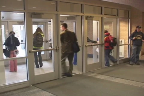 Students entering/exiting library Stock Footage 548971