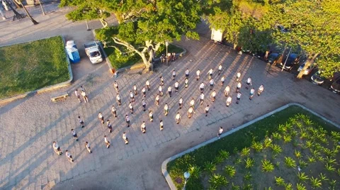 Students exercising in park Stock Footage 62890412