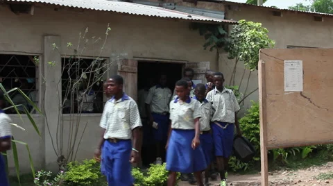 STUDENTS EXIT A CLASSROOM Stock Footage 60523503