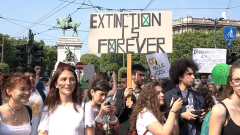Students at Friday for future demonstration, protester picket signs, Milan Italy Видео 110771795