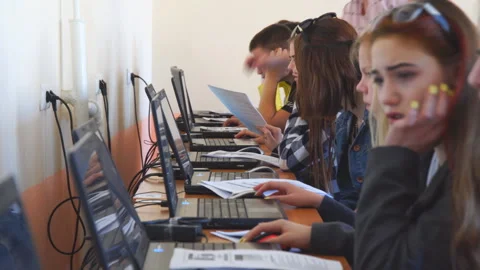 Students in front of computers in a computer class Video stock 107005804