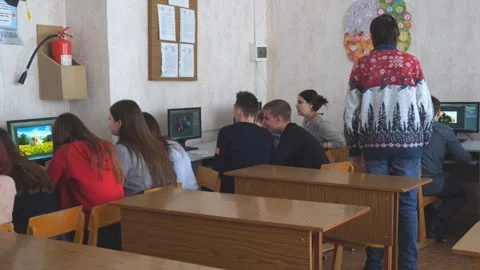 Students in front of computers in a computer class. Video stock 124227343
