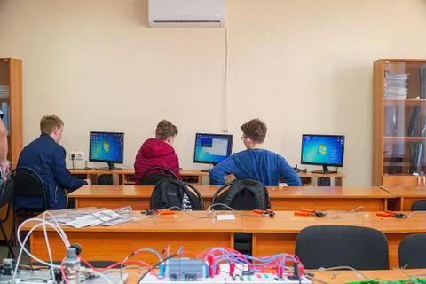 Students in front of computers in a computer class 写真素材