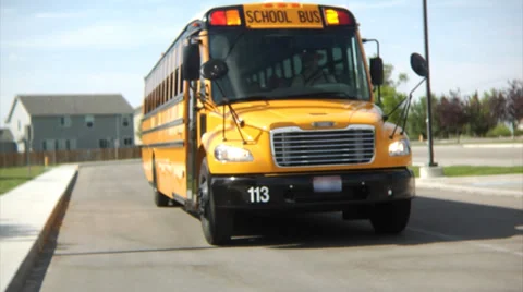 Students getting off school bus Stockbeeldmateriaal 32708310