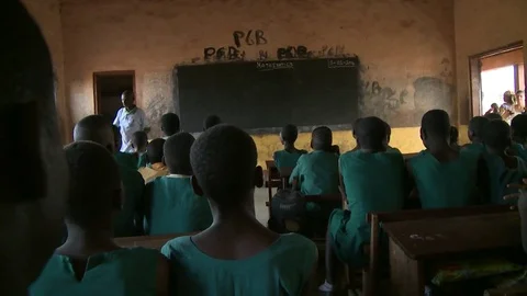 Students in Ghana primary school watch teacher - Northern Ghana Circt 2014 Stock Footage