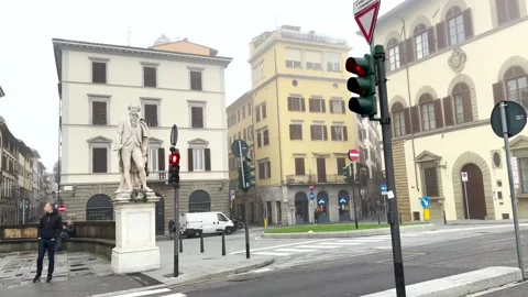 Students going to school in the morning on a cold and foggy day in Florence Stock Footage 264711736