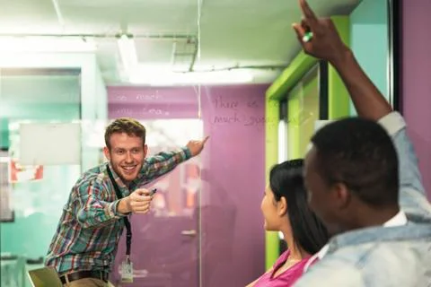 A students group learning at school academy. Student Concept. Stock Photos