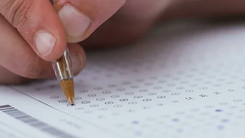 Student's hand filling  multiple choice test Stock Footage 80026253