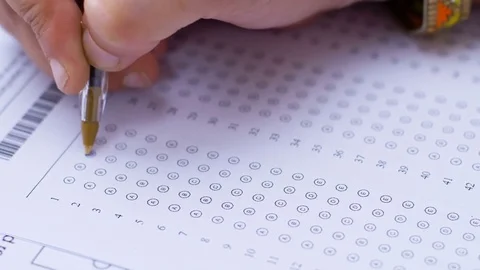 Student's hand marking multiple choice test Stock Footage 80030089
