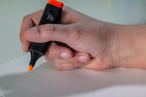 A Students Hand Ready for Study. Stock Photos