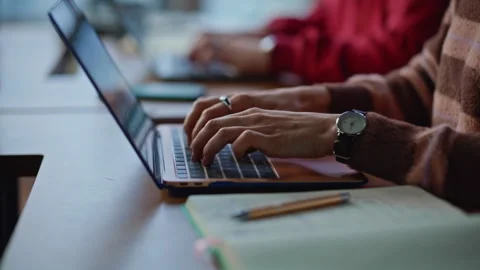 Students hands typing computers at remote workplace closeup. Freelancers working Stock Footage 340110008