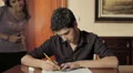 students have fun doing a architectural design - lover - exam - laugh - kiss HD Footage