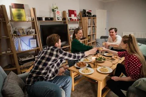 Students Having a Dinner Party 스톡 사진