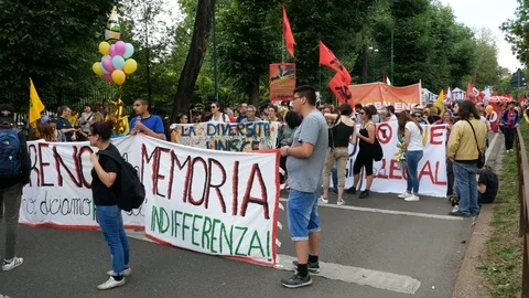 Students hold banners during demonstration in Milan, Italy Stock Footage 76080999