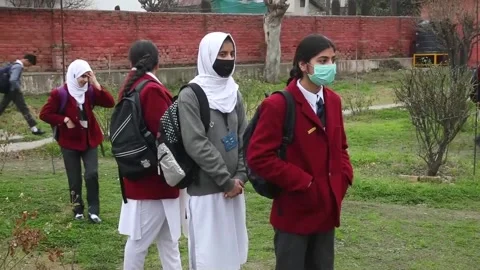Students in Indian Kashmir return to schools after winter vacation, INDIA, IN -  Stock Footage 234385157