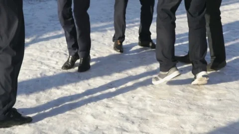 Students jump on the snow in the winter Vídeo Stock 78652882
