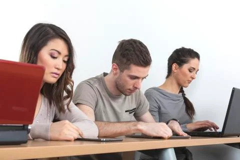 Students with laptops and tablets Stock Photos