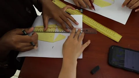 Students learn to draw fashion patterns in the classroom. Stock Footage 243627674