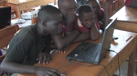 Students learn how to work on computer in one of the poorest states in Africa Stock Footage 53160406