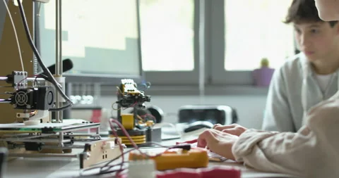 Students learning 3D printing in the lab at school Stock Footage 168337002
