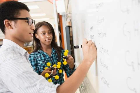 Students learning about chemistry model Foto stock