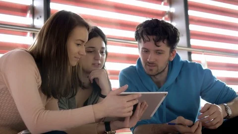 Students learning additional from a tablet watching a video 스톡 동영상 75555068