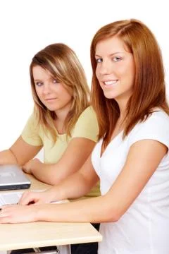 Students learning at desk Stock Photos
