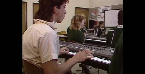 STUDENTS LEARNING ELECTRONIC MUSIC,  AUSTRALIA (1986) Stock Footage 240083145