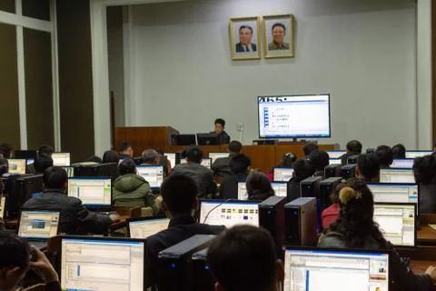 Students learning programming in a computer study room in Pyongyang, North Ko Stock Photos