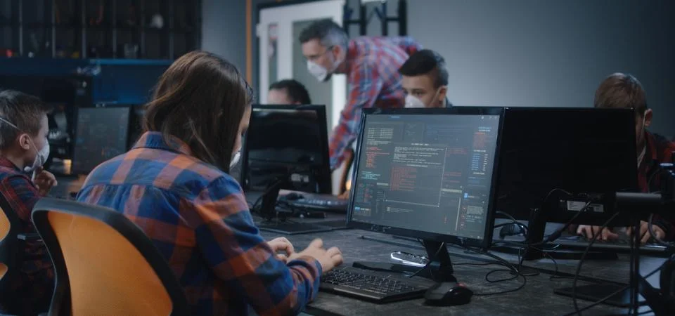Students learning programming in school 스톡 사진