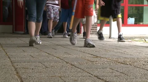 Students leave school Stock Footage 8698661