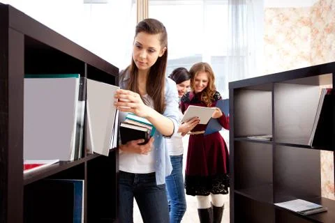 Students in a library Stock Photos
