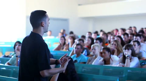 Students listen a lecture at the university amphitheater Stock Footage