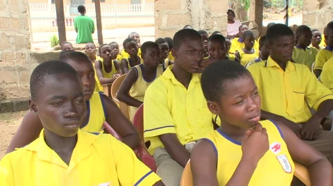 STUDENTS LISTENING TO SPEECH AT SCHOOL ASSEMBLY Stock Footage 60115519