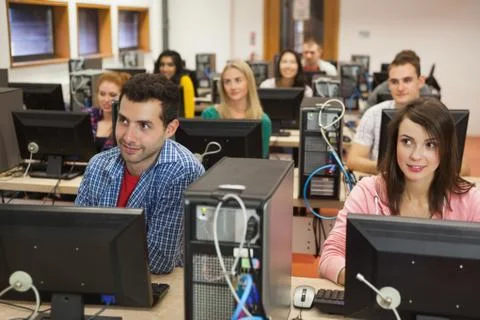 Students listening in their computer class 写真素材