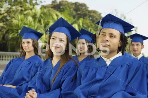 Students Looking Away During Graduation Ceremony Stock Photos