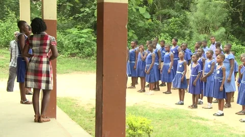 STUDENTS MARCHING IN PLACE SINGING "ARISE GHANA YOUTH" Stock Footage 60116228