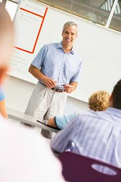 Students in math class with teacher Stock Photos