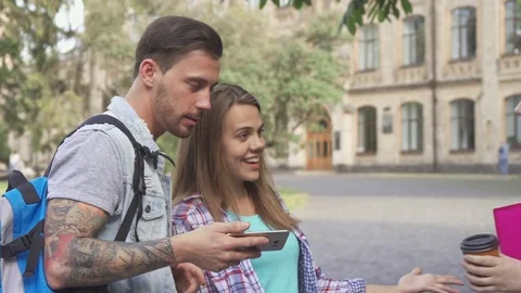 Students meet on campus Stock Footage 79783158