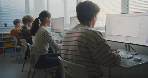 Students In Modern Classroom Work on Software Projects, Coding on Computers Stock Footage 318521936