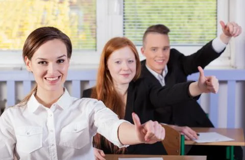 Students with okay gesture Stock-Fotos