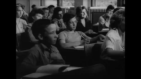 Students paying attention to professor in the class Stock Footage 83656579