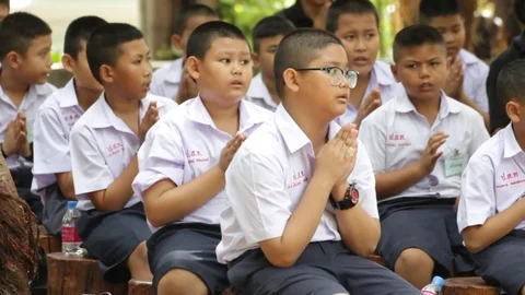 Students of Pieamsuwan school in Buddhist Camp, Students are praying Stock Footage 76906920