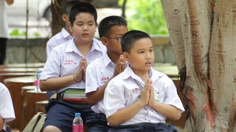 Students of Pieamsuwan school in Buddhist Camp, Students are praying Stock Footage 76909042